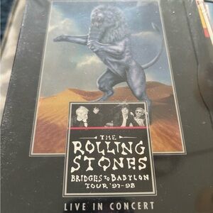 Two unopened Rolling Stones DVDS. Bridges to Babylon; rock ‘n’ roll Circus